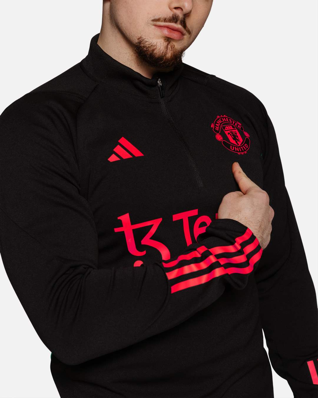 Haut d'entrainement Manchester United - Noir/Rouge/Vert